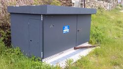 A transformer in a substation cabinet