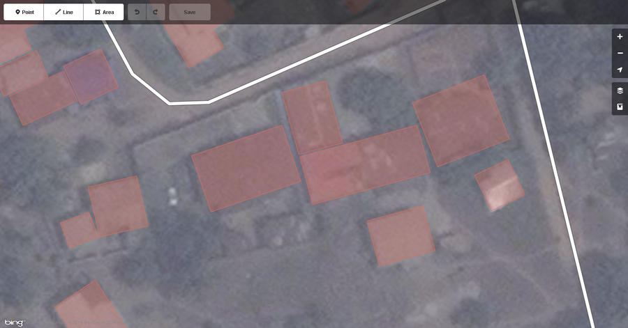 Typical buildings in West African city mapped correctly displayed in the iD web browser OSM editor.