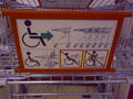 Sign on wheelchair trolley
