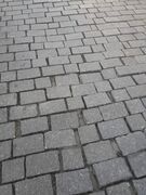 Damaged and loose paving stones.jpg