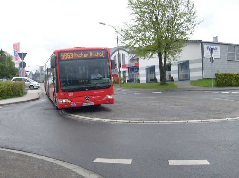 File:Mini-Roundabout Aachen with Bus.jpg