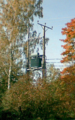Typical Finnish 20 kV line (topmost), a transformer and the resulting 400 V line.