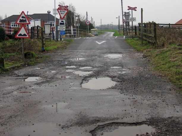 File:Potholes at the Level Crossing, Barrow Haven - geograph.org.uk - 1621073.jpg