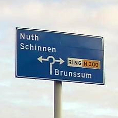For a ring route signed as RING N 300 and RING N 281 (where RING serves as an additional road reference) add ref=RING to the ring route relation. N 300 and N 281 are separate route relations with network=NL:N and ref=N300/ref=N281.
