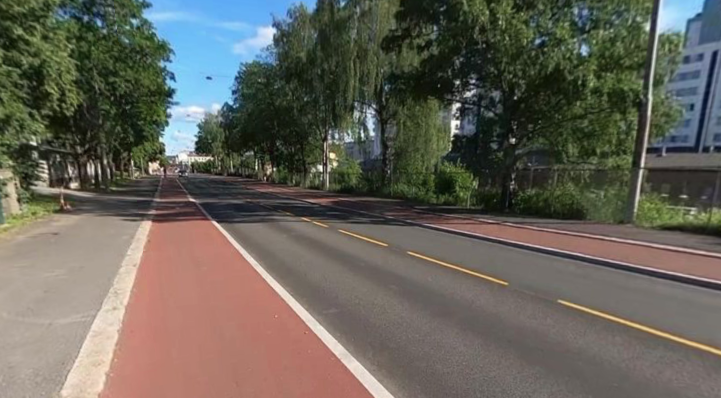 File:Raised cycle lane with red asphalt.png