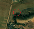1/5 Power pole (power=pole) visible due to its thin and long shadow cast (Maxar satellite imagery).