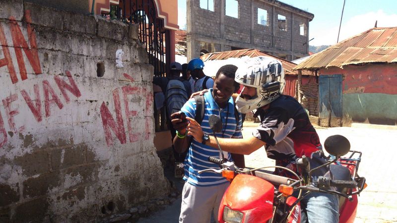 File:Wolf Moto Team With Helmet Camera HOT Cap Haitien Haiti.jpg
