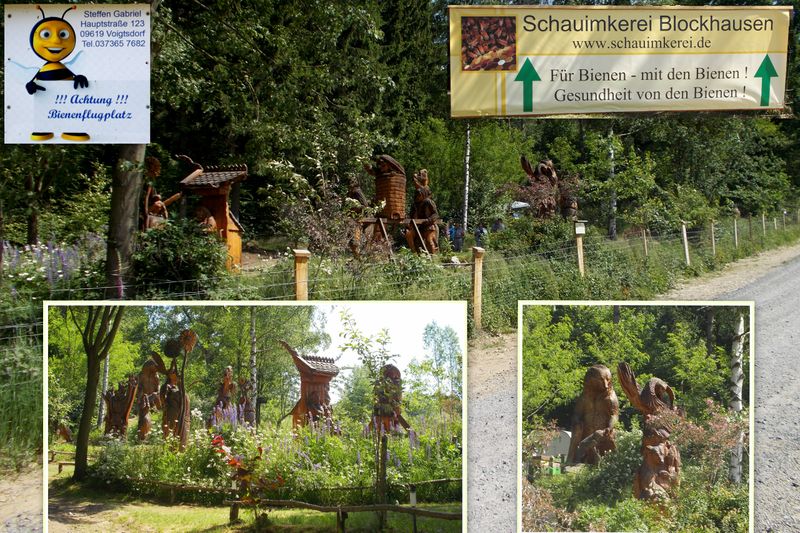 File:2014 Blockhausen mit Kettensäge geschnitzte Beuten beim Schauimker am Wanderweg.jpg