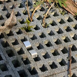 Fibre reinforced polymer grate used to build a walking path