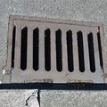 Small storm drain in the street