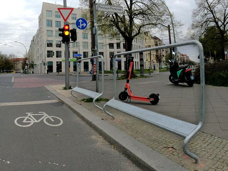 File:Cyclist leaning rail 2 Mapillary by stefanhrt.jpg