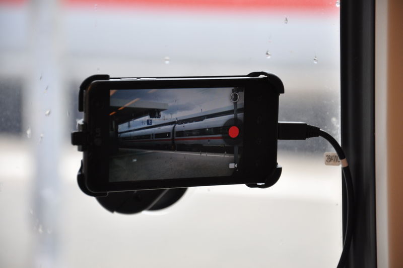 File:Smartphone car mount inside a train.JPG