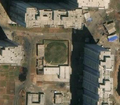2/5 Covered reservoir (man_made=reservoir_covered) round-shaped in the middle of a dense urban area in Pyongyang (Maxar satellite imagery).