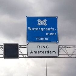 For a ring route announced as RING Amsterdam add name=Ring Amsterdam to the ring route relation.