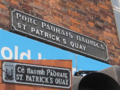 St. Patrick's Quay in Cork. Different spelling (of the irish name) on two edges of the same building.