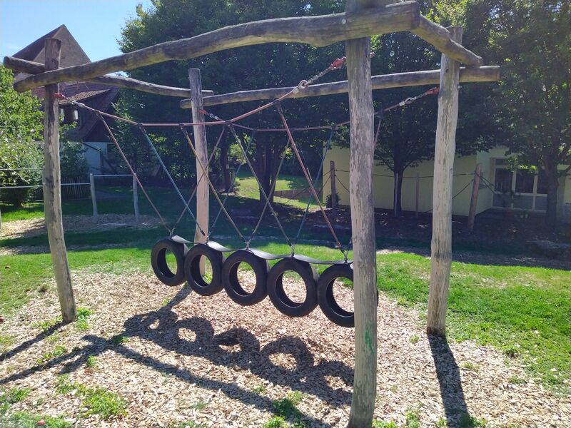 File:Playground rope or tire swing.jpg